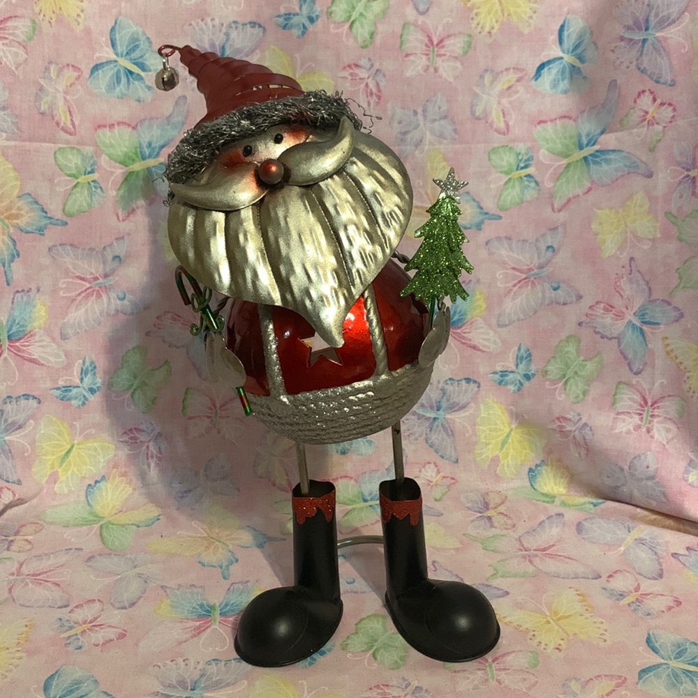 Santa Bobble Head LED tea light votive holder. 16” h from Pier 1